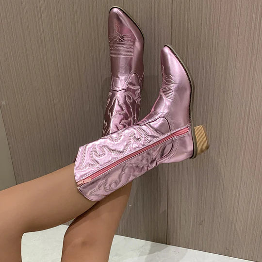 Pink metallic cowboy boot showing the inside zip and stitched shaft