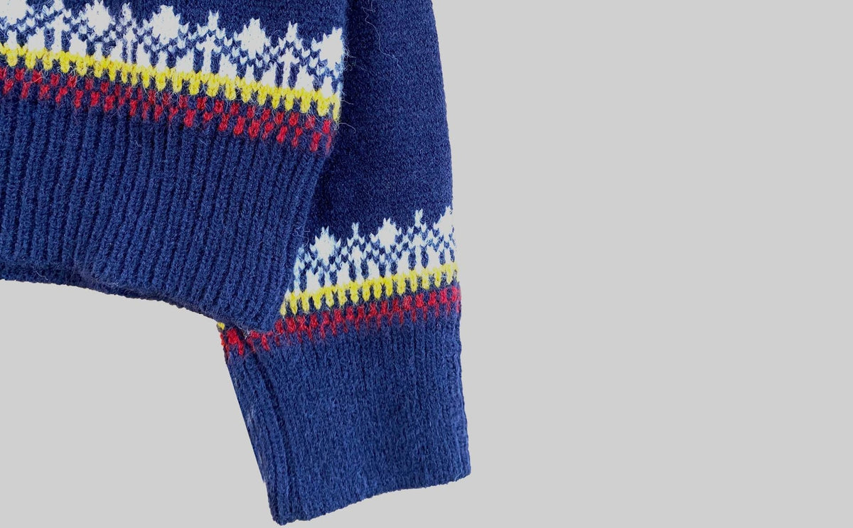 Matching his and hers Fair Isle Christmas jumper with a stand-up neck