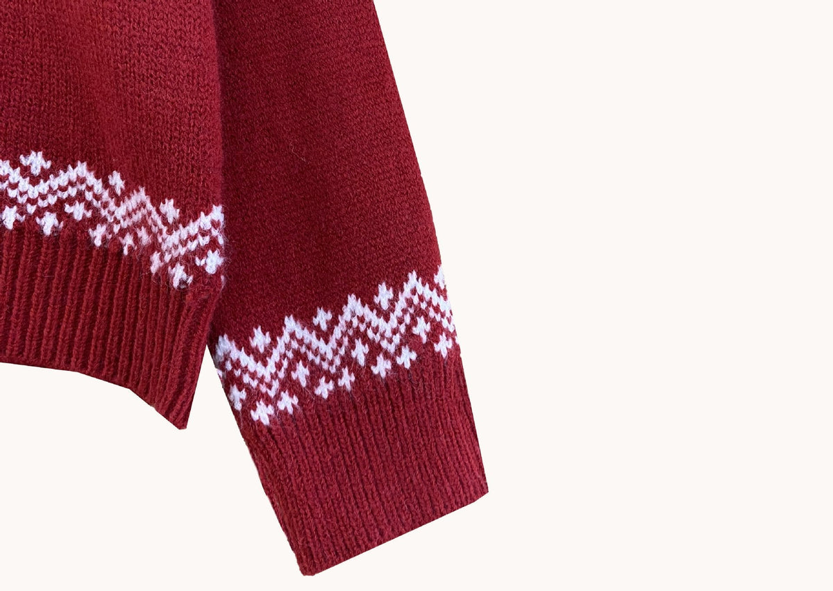 Matching his and hers Fair Isle Christmas jumper with a stand-up neck