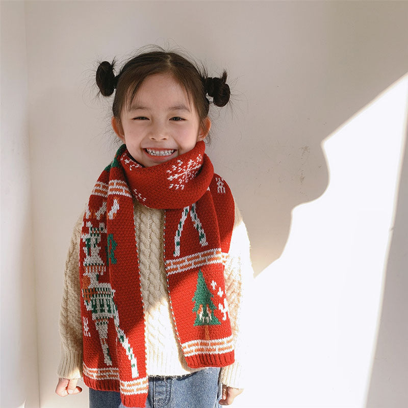 Red knitted Christmas scarf with a reindeer and trees, for parent and child - child