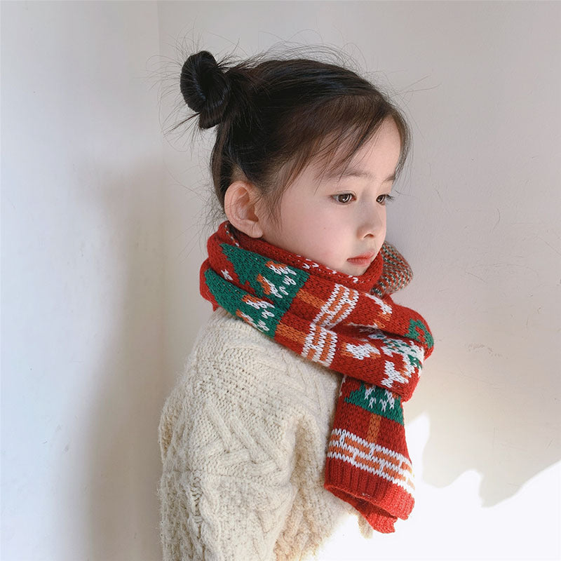 Red knitted Christmas scarf with a reindeer and trees, for parent and child