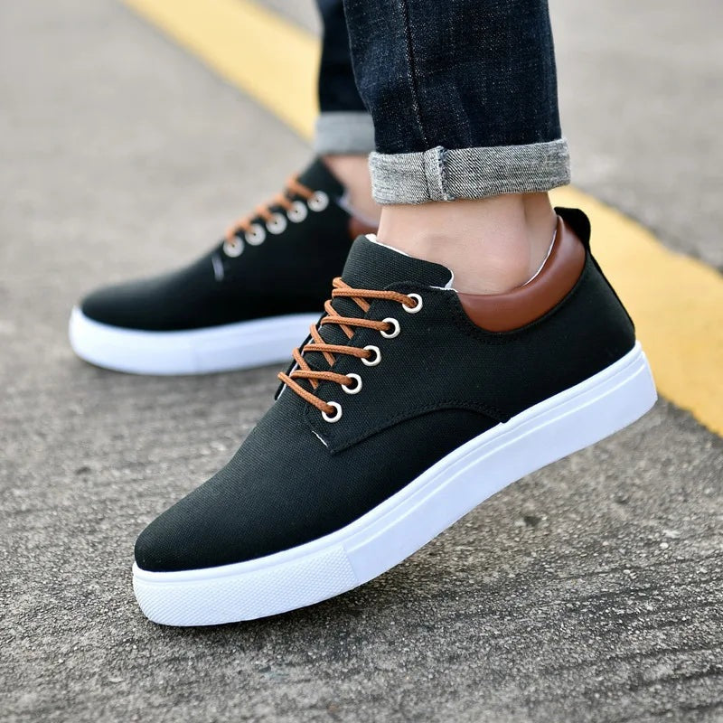 Men's canvas trainers with a white rubber sole, tan laces and a faux leather heel piece - black