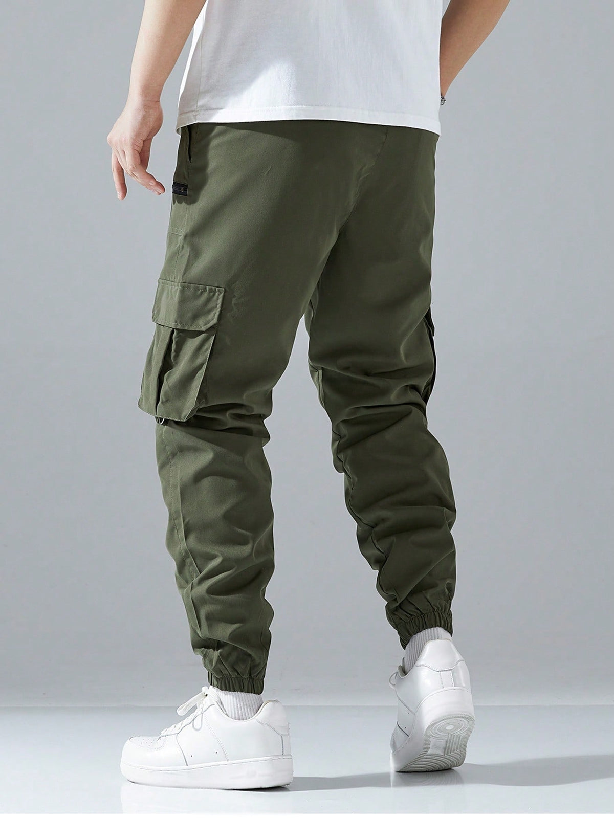 Cargo joggers for men with a drawcord waist, zip pockets, thigh flap pockets and cuffed ankles - olive