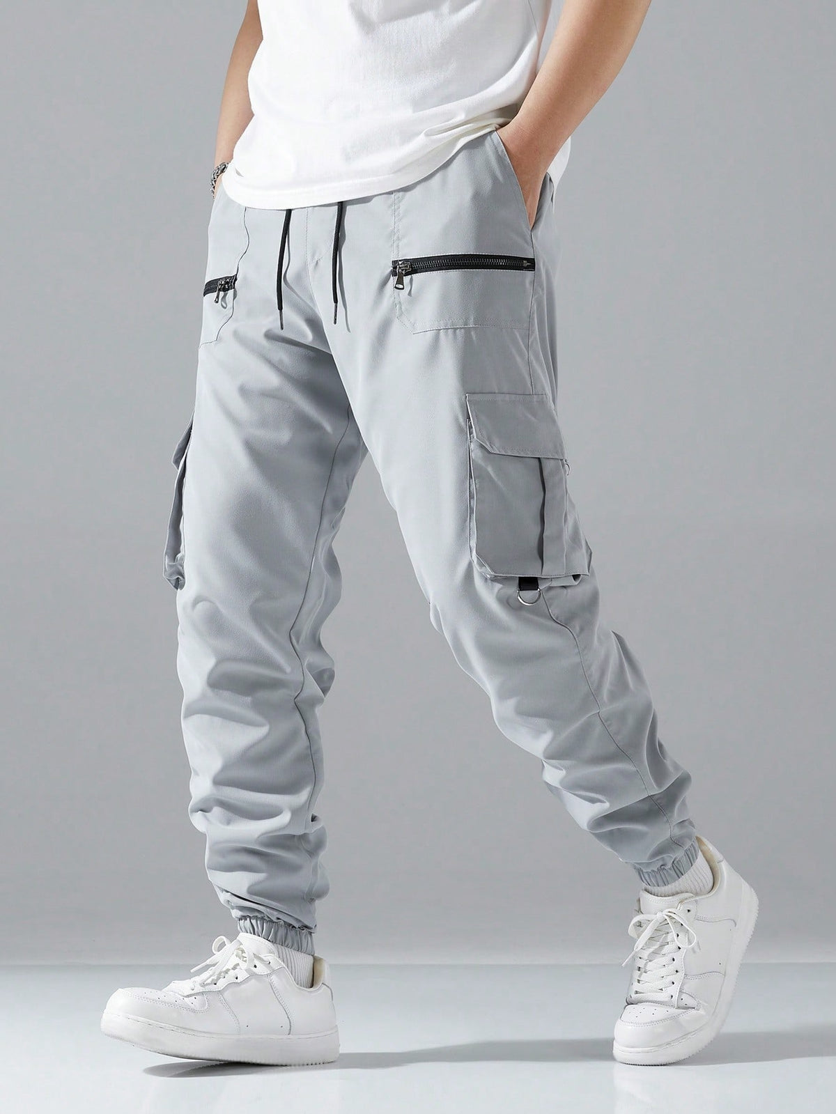 Cargo joggers for men with a drawcord waist, zip pockets, thigh flap pockets and cuffed ankles - view 13