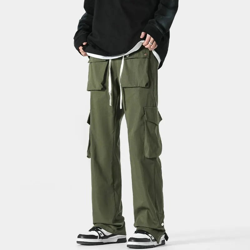 Men's cargo trousers with flap pockets at the waist and thighs, a drawcord and popper hems - army green