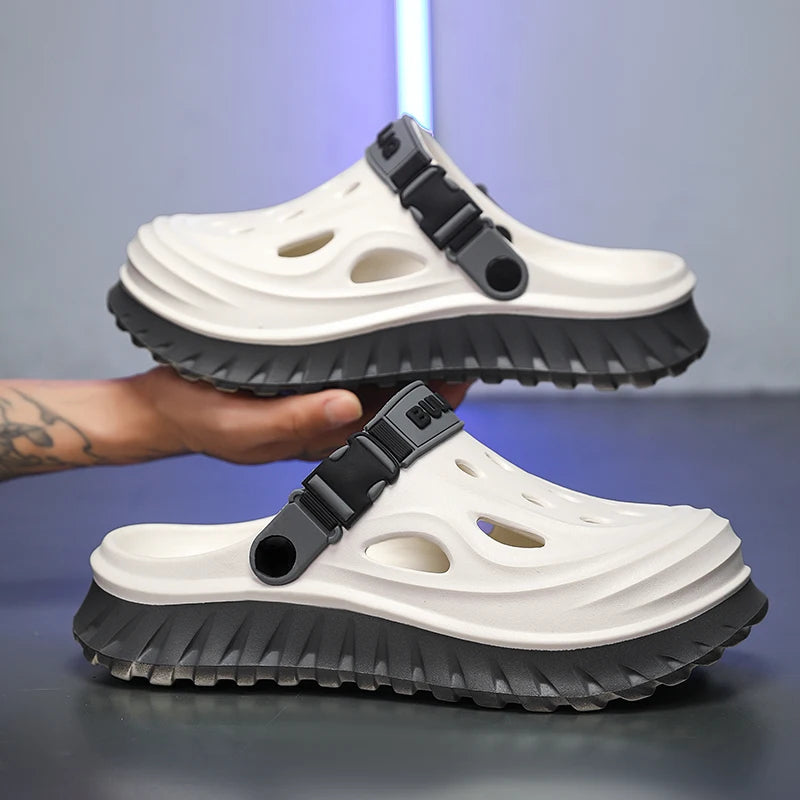 EVA clogs with a high sole, closed toe, vent holes and buckle heel strap - white / grey sole