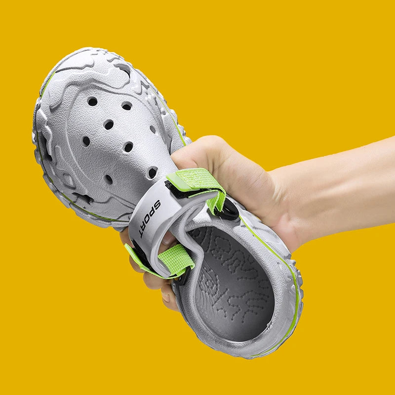 Men's EVA clogs with vent holes, side cut-outs, chunky lug sole and pivoting heel strap