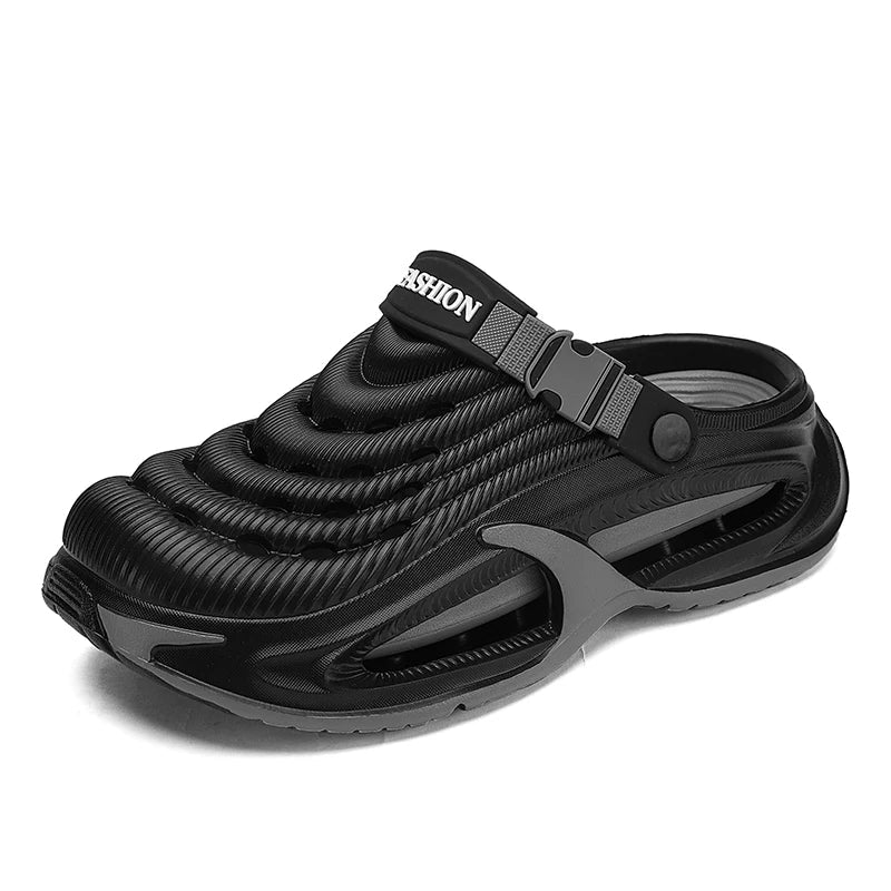 Men's EVA clogs with a closed toe, vent holes on top, buckled heel strap and thick sole - black