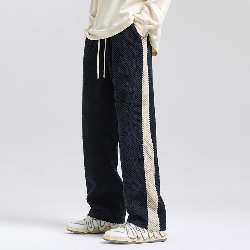 Men's corduroy joggers with a wide side stripe and a drawcord waist - black
