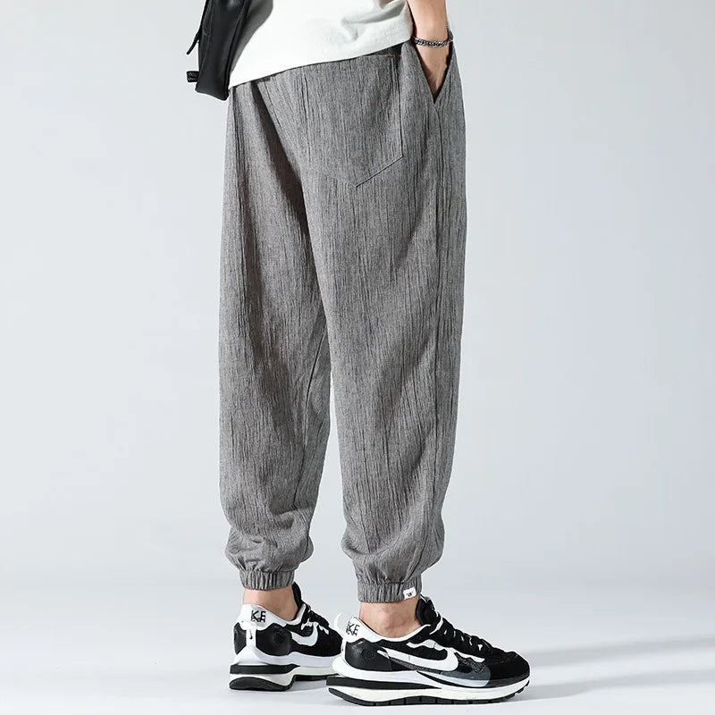 Men's lightweight cotton linen trousers with elasticated cuffs and a beaded drawcord - view 3