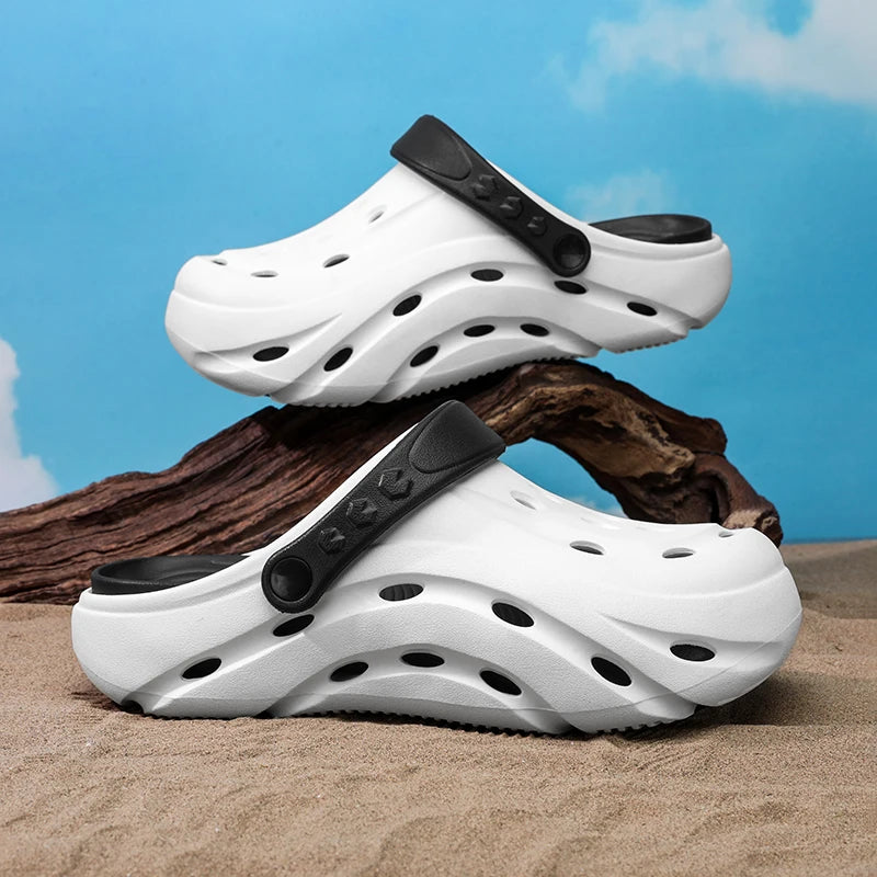 EVA clogs with a closed toe, vent holes, thick sole and pivoting heel strap - view 3