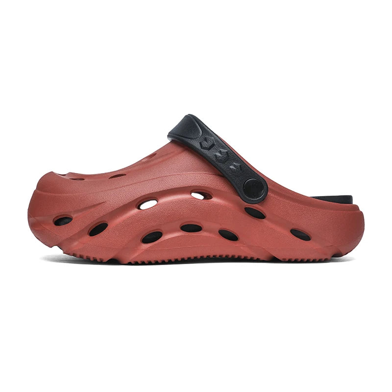 EVA clogs with a closed toe, vent holes, thick sole and pivoting heel strap - brick red