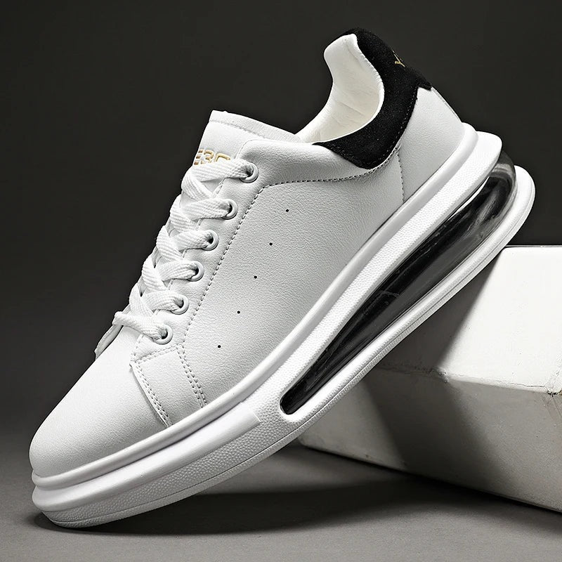 Men's faux leather trainers with a thick sole, visible air cushion and suede-look heel piece - white and black