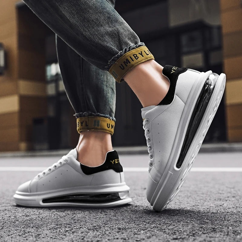 Men's faux leather trainers with a thick sole, visible air cushion and suede-look heel piece - view 6