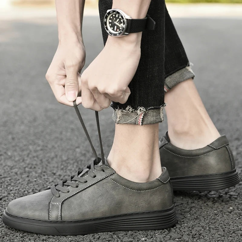 Men's matte faux leather trainers with white contrast stitching and a ribbed cupsole - view 5