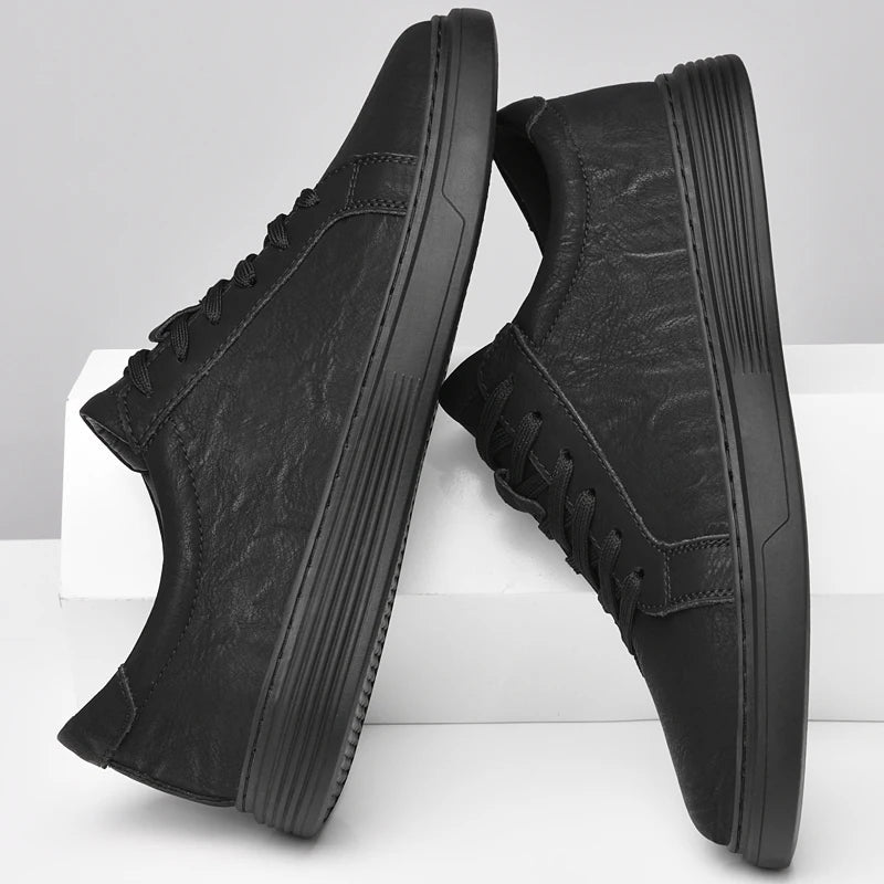 Men's matte faux leather trainers with white contrast stitching and a ribbed cupsole - view 7