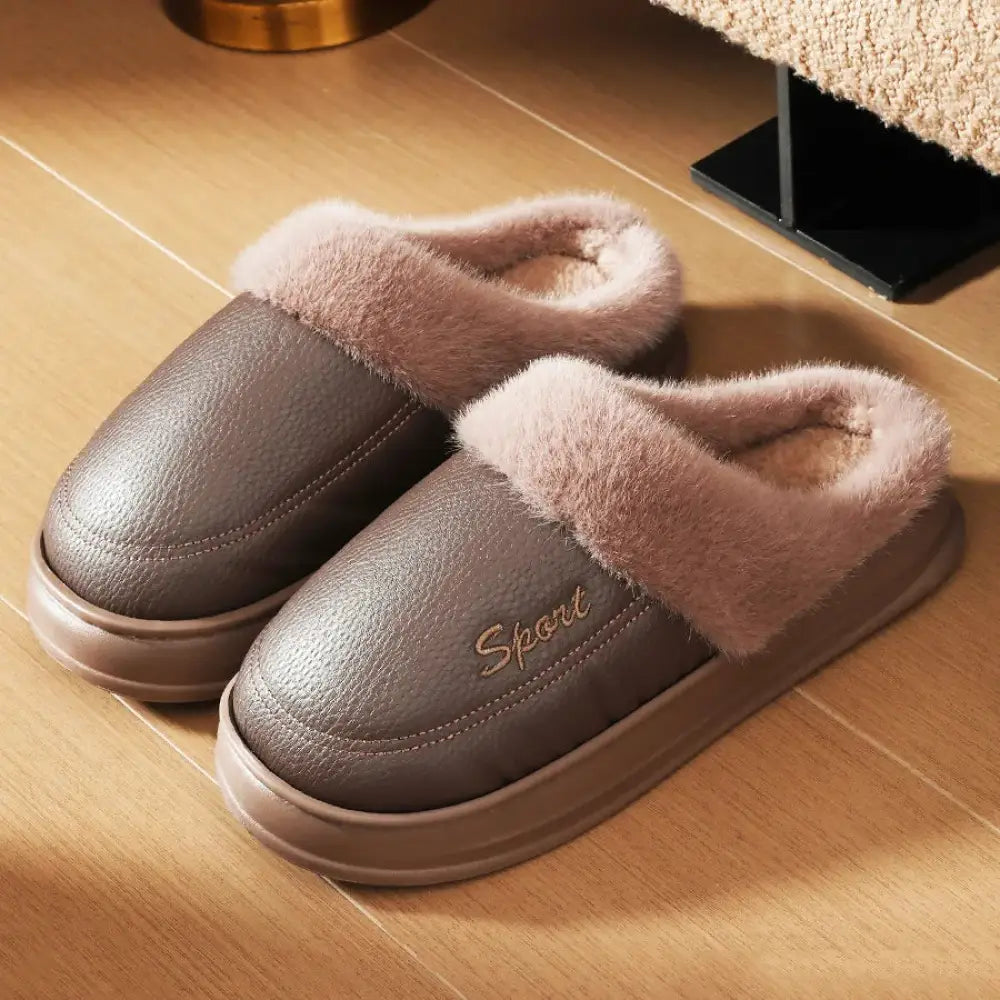 Mule slippers with a smooth faux leather upper, plush lining and cuff and a thick sole - brown