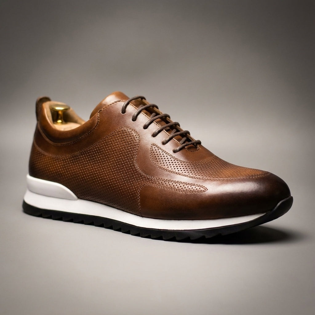 Men's glossy faux leather trainers with perforated panels and a white midsole - cognac