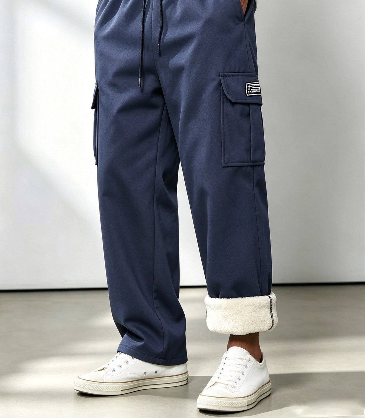 Fleece-lined cargo trousers for men with a drawcord waist, thigh flap pockets and a straight leg - navy