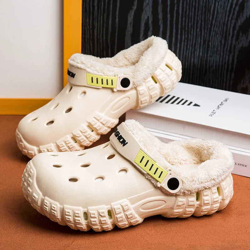 Clog slippers with a vented EVA upper, fleece lining, thick sole and pivoting heel strap
