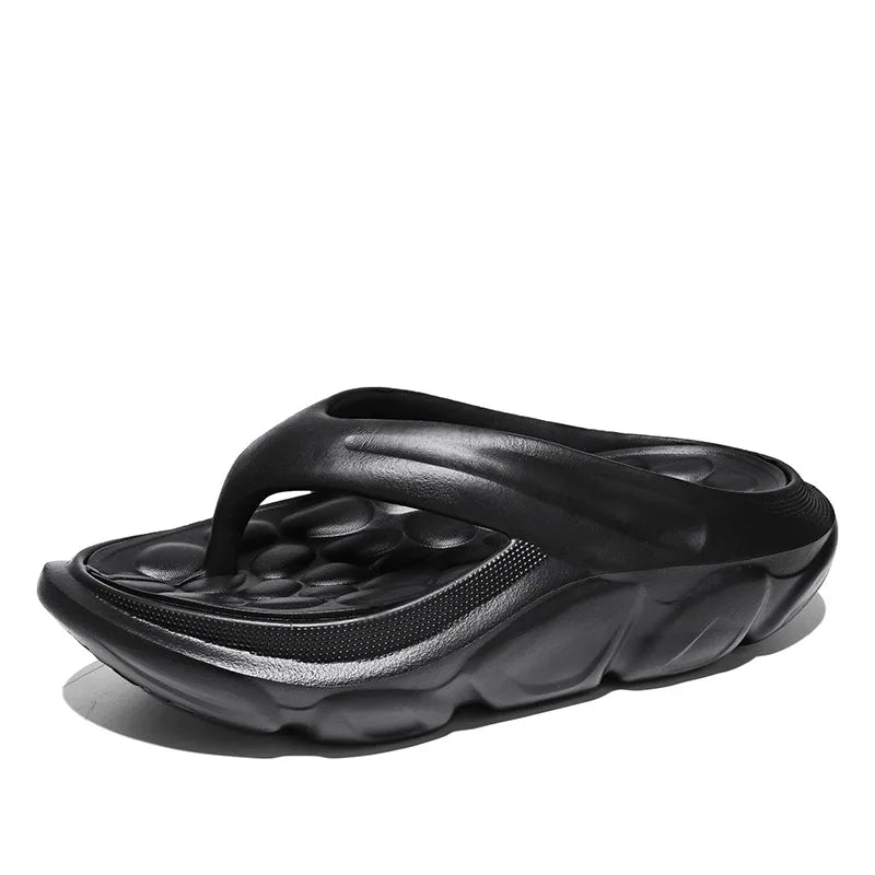 Men's EVA flip flops with thick sole, pebble-shaped nubbed footbed and wide strap - black