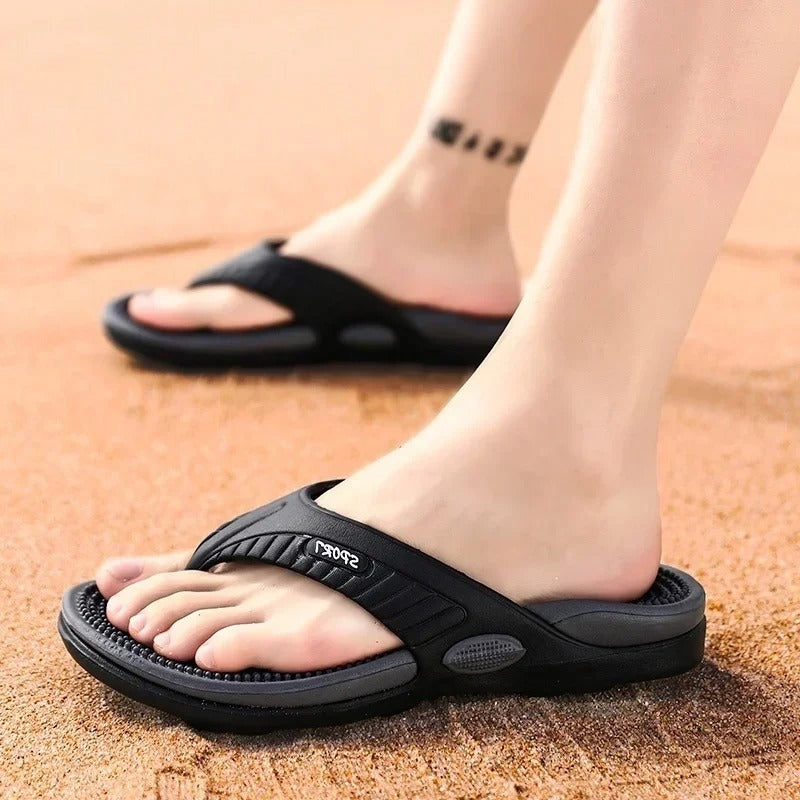 Flip flops with a studded footbed, wide toe strap and sole with tread