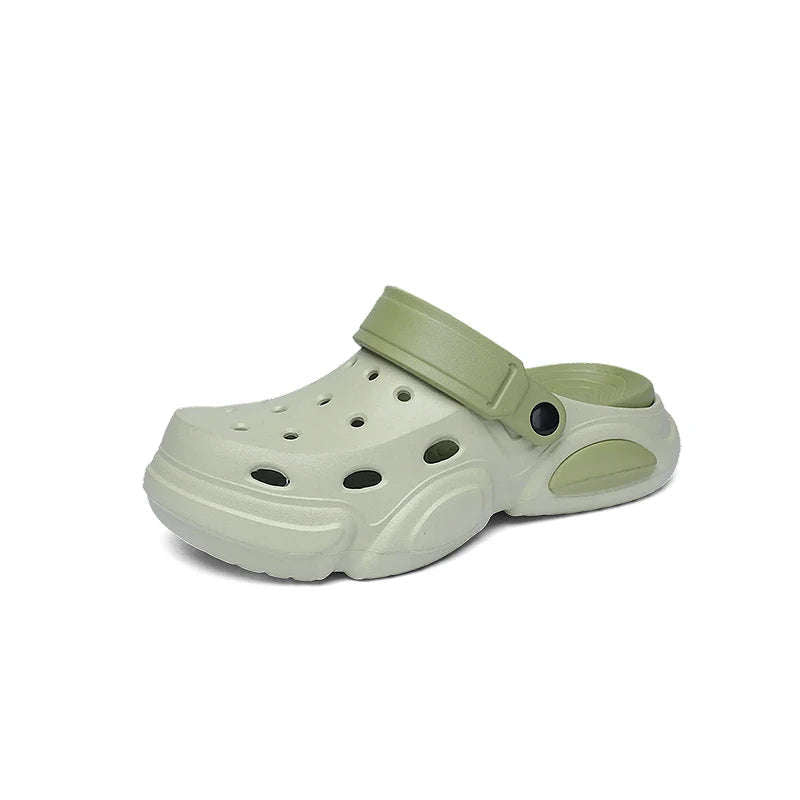 Men's garden clogs in EVA with vent holes, a pivoting heel strap and a wavy relief footbed - green