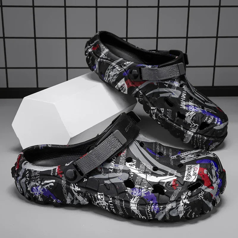Men's garden clogs in EVA with an all-over graffiti print, vent holes and pivoting heel strap - black