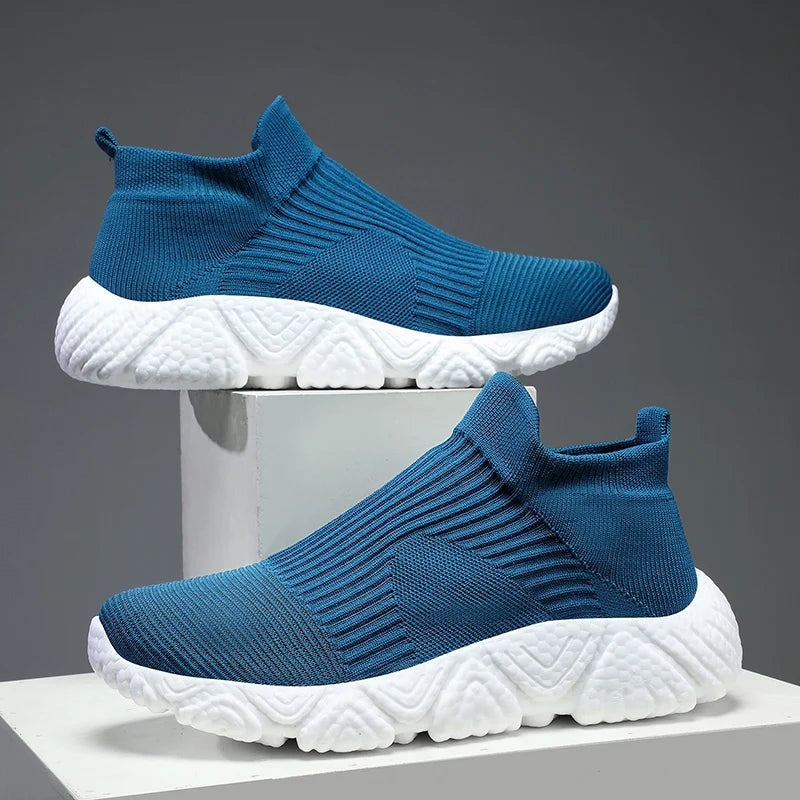 Men's knit slip-on trainers with a sock collar and a chunky textured foam sole - petrol blue