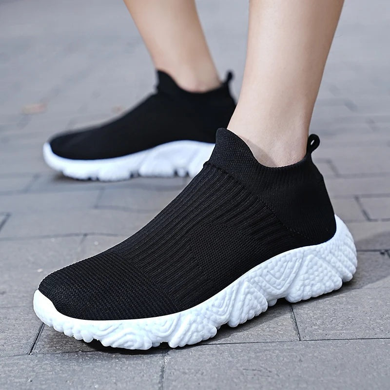 Men's knit slip-on trainers with a sock collar and a chunky textured foam sole - view 8