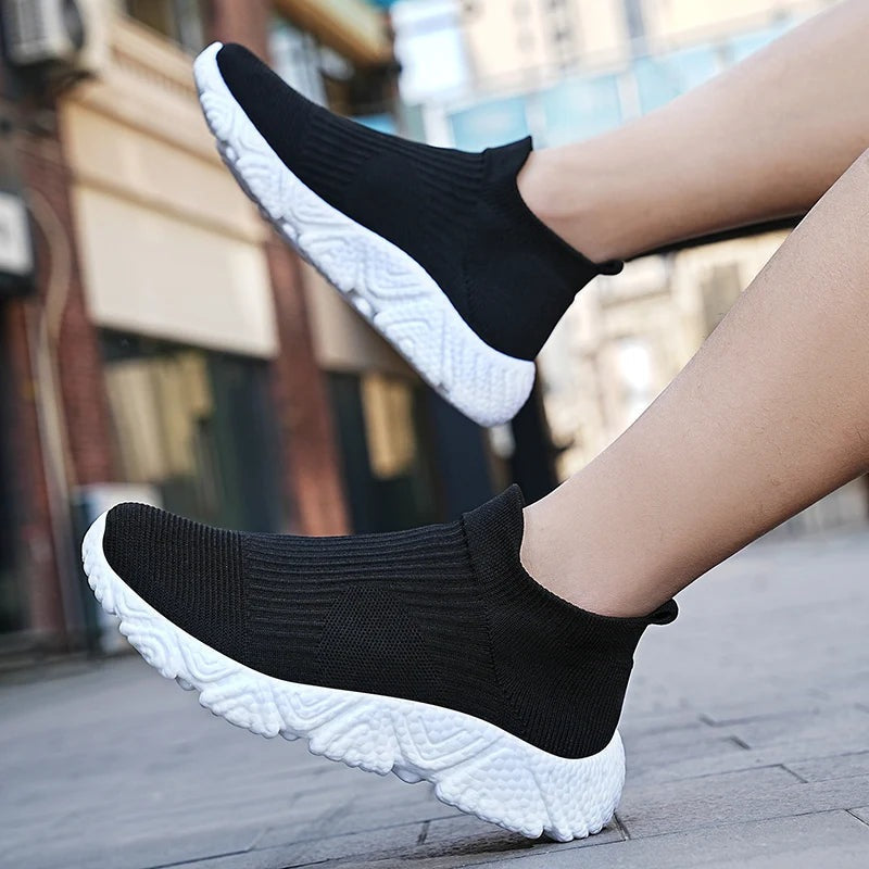 Men's knit slip-on trainers with a sock collar and a chunky textured foam sole - view 9