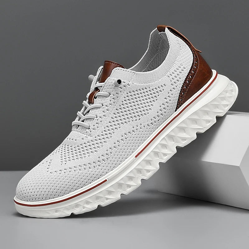 Men's knit mesh trainers with a faux leather heel, red trim along the sole and elastic laces - light grey