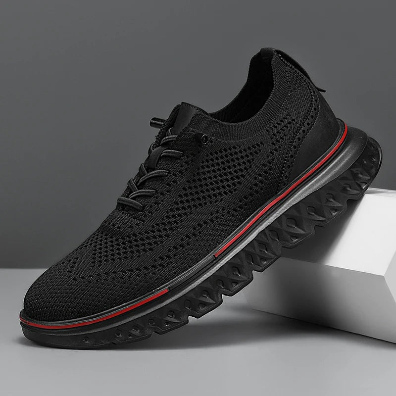 Men's knit mesh trainers with a faux leather heel, red trim along the sole and elastic laces - black