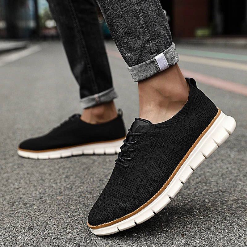 Men's knit trainers with a faux leather lace panel and a lightweight white sole - view 6