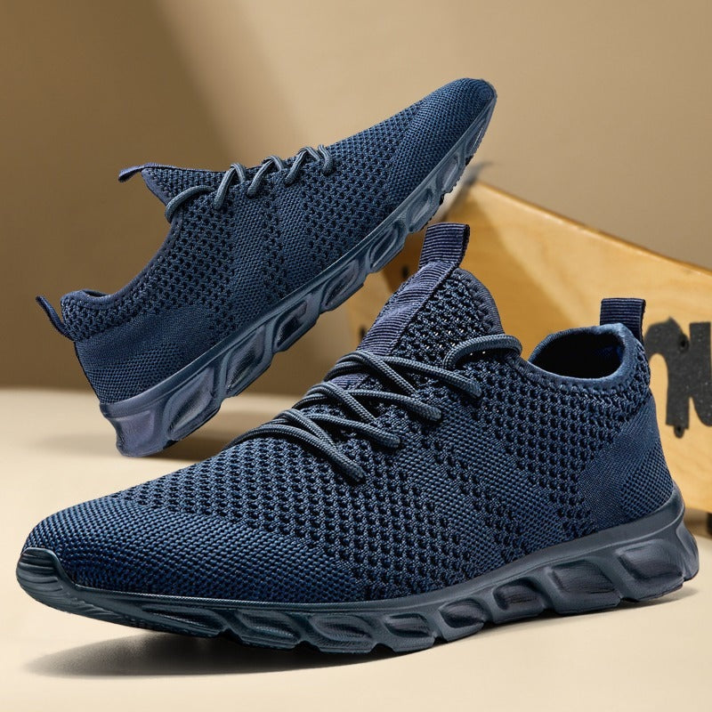 Men's knit trainers with a sock-like collar, flexible wave sole and heel loop - navy
