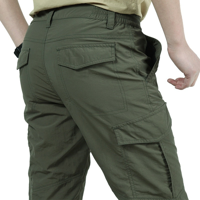 Lightweight cargo trousers for men with thigh flap pockets and flap pockets on the back - olive