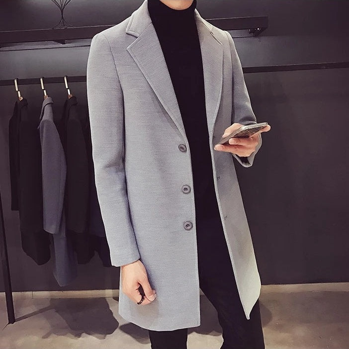 Men's light grey longline coat from the side