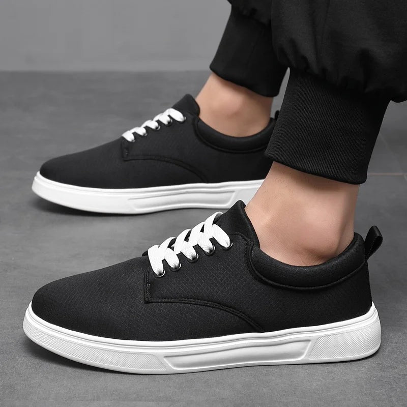 Men's low trainers in woven cotton with a white sole and white laces - black