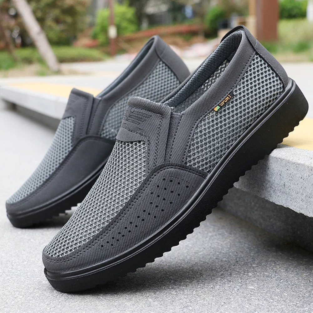 Men's mesh slip-on shoes with a perforated toe