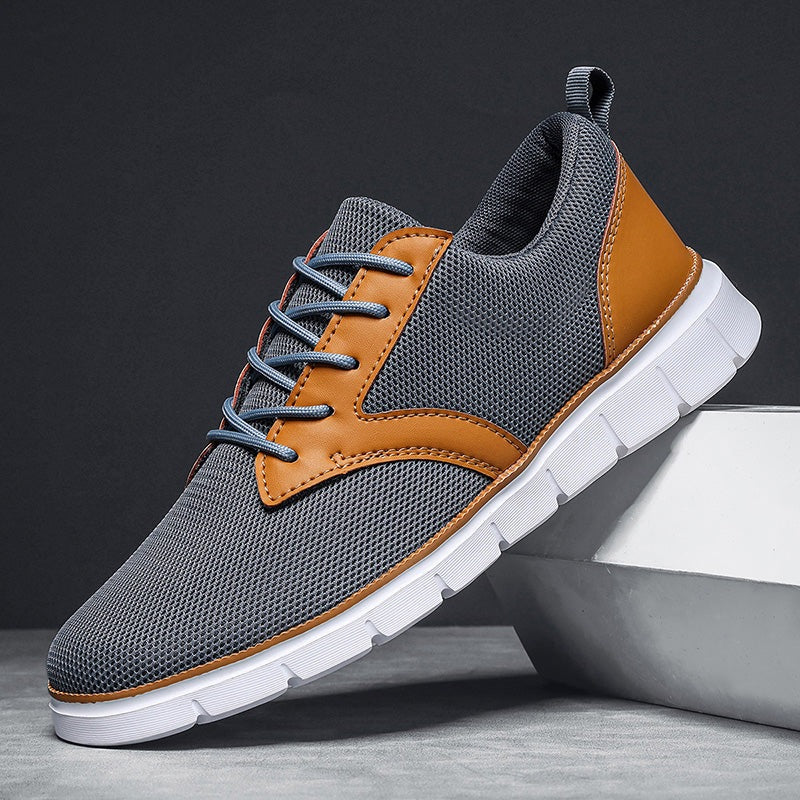 Men's mesh trainers with a saddle-shaped faux leather panel, white rubber sole and heel tab - grey