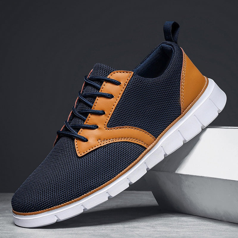 Men's mesh trainers with a saddle-shaped faux leather panel, white rubber sole and heel tab - navy