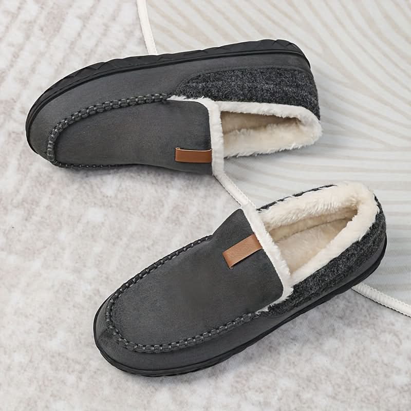 Men's moccasin slippers with a plush lining and rubber sole