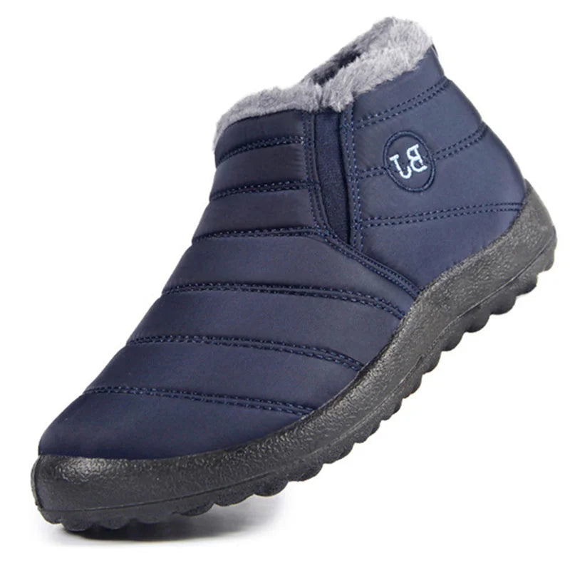 Men's snow boots with a quilted upper, side elastic, plush collar and tread sole - navy