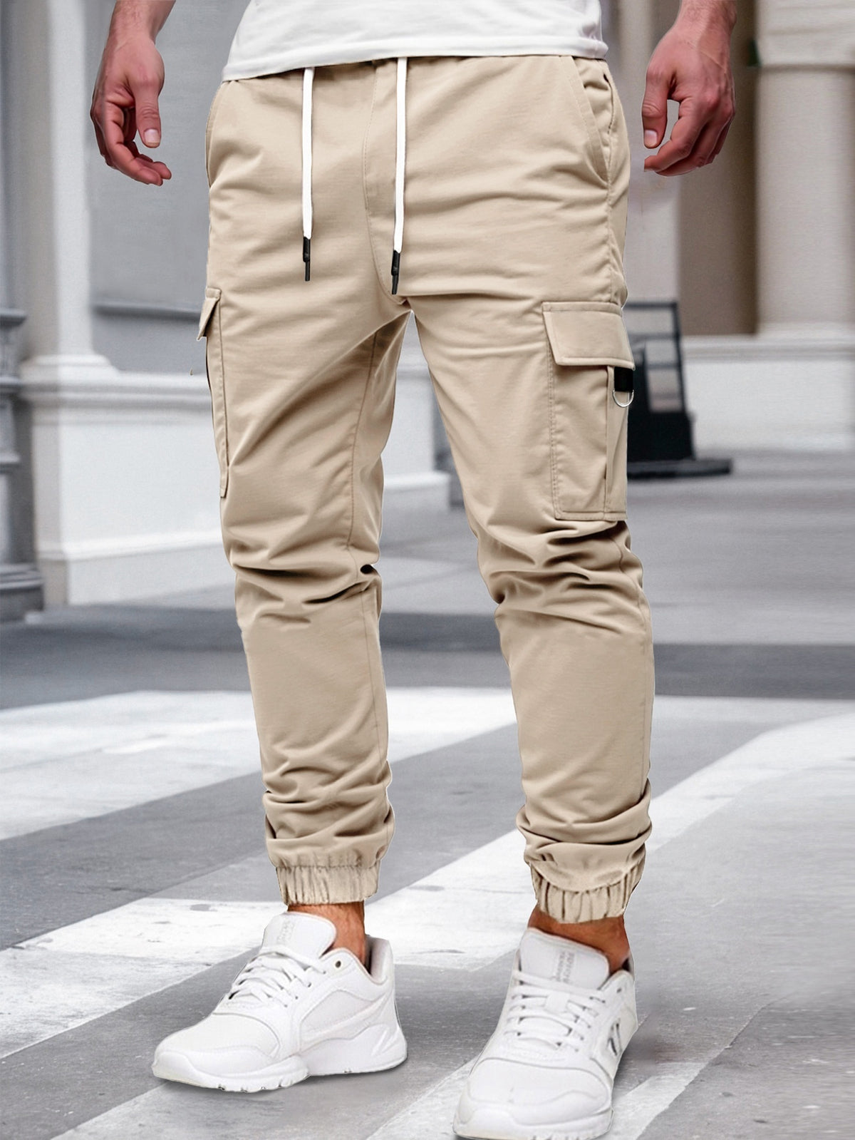 Relaxed cargo joggers for men with a drawcord waist, thigh flap pockets and cuffed ankles - beige