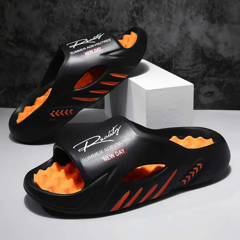 Men's sliders in EVA with a nubbed footbed in a contrast colour and side cut-outs - black/orange