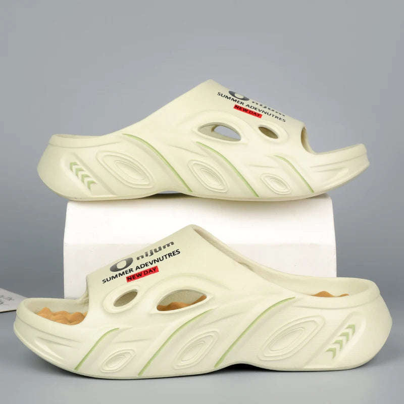 Men's EVA sliders with nubbed footbed, wide vented band and thick sole - light green
