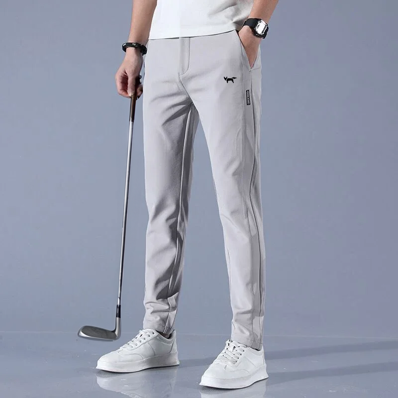 Men's slim fit golf trousers in grey, front view with a golf club