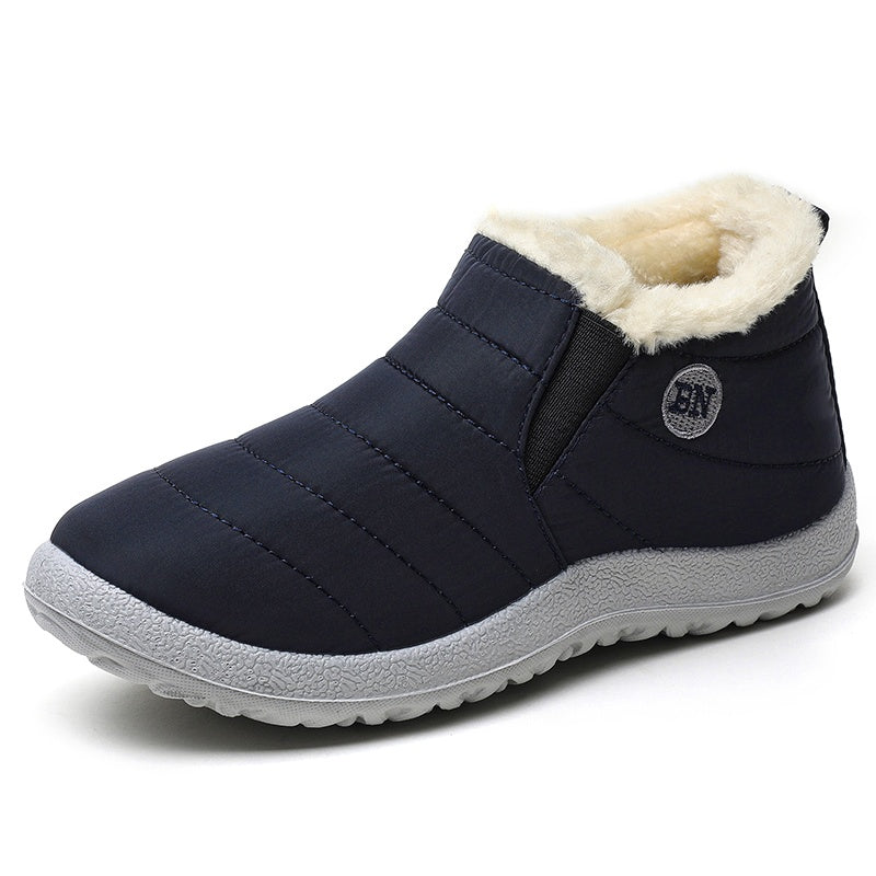 Men's slip-on winter boot with a plush collar, light grey tread sole and quilted upper - navy