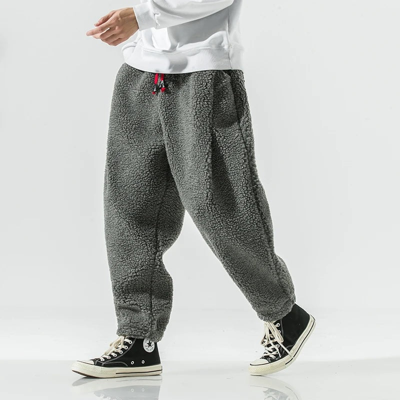 Men's teddy fleece joggers with a red drawcord and elasticated ankle cuffs - view 8