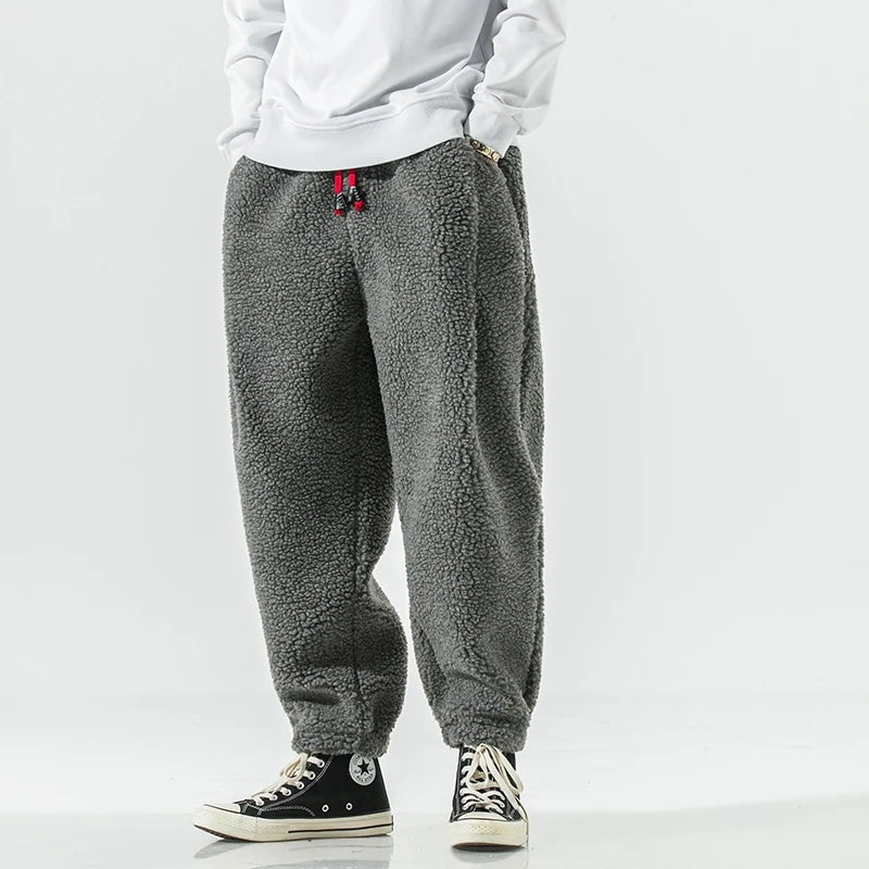Men's teddy fleece joggers with a red drawcord and elasticated ankle cuffs - view 9